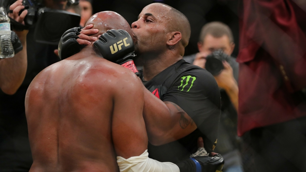 Daniel Cornier kisses Anderson Silva after their fight during the UFC 200 event at T Mobile Arena