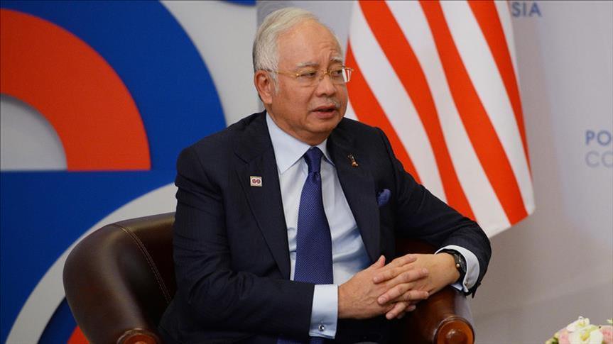 Malaysia PM wants those in US lawsuit to clear names