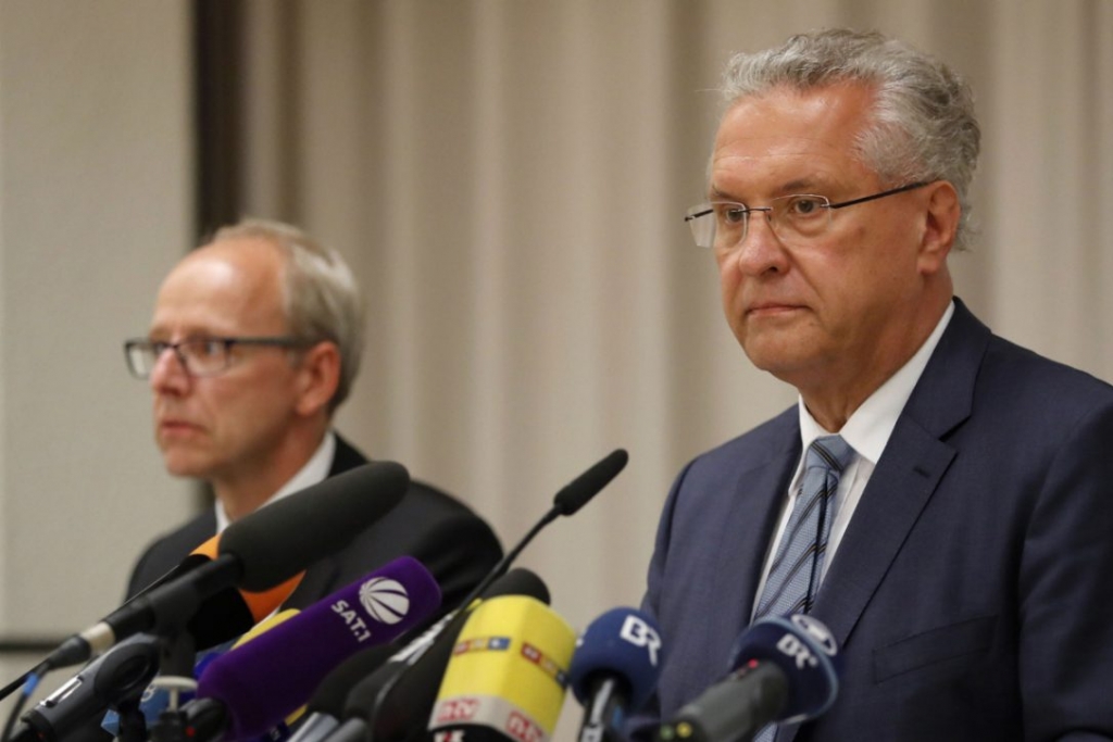 Bavarian interior minister Joachim Herrmann briefs the media in Ansbach Germany on Monday