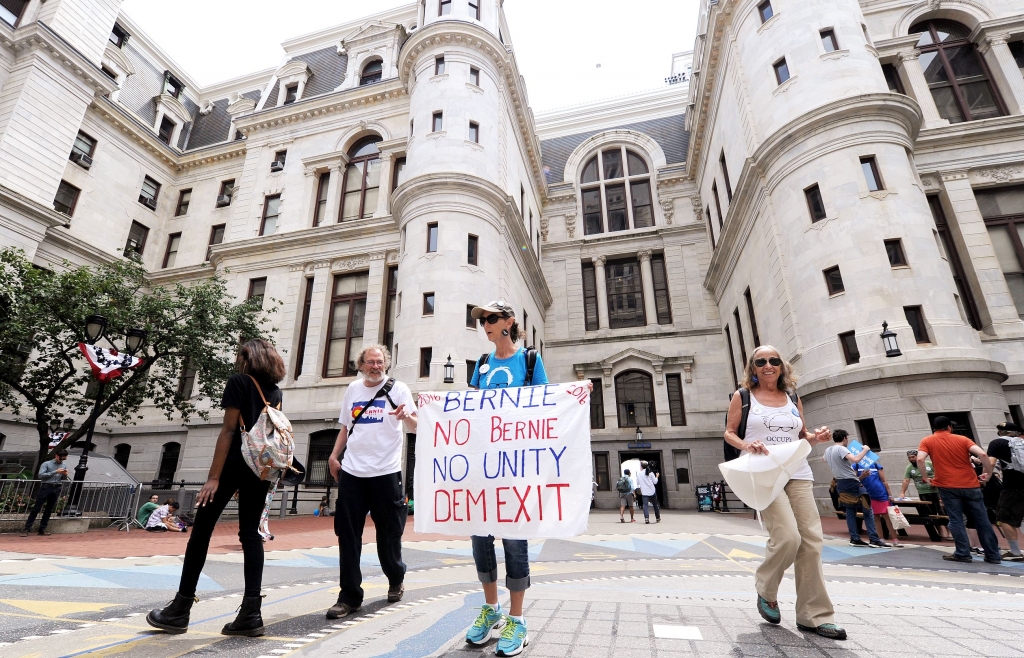 20160726mfdncloc04-1 Bernie Sanders supporters stand outside City Hall Tuesday before the start of the convention