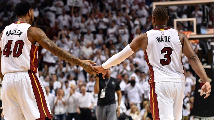 Miami FL USA Miami Heat forward Udonis Haslem greets Heat guard Dwyane Wade during the second quarter in game four of the second round of the NBA Playoffs against the Toronto Raptors at American Airlines Arena. Mandatory Cre