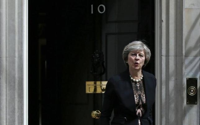 Britain's Home Secretary Theresa May leaves after attending a cabinet meeting at Number 10 Downing Street in London Britain