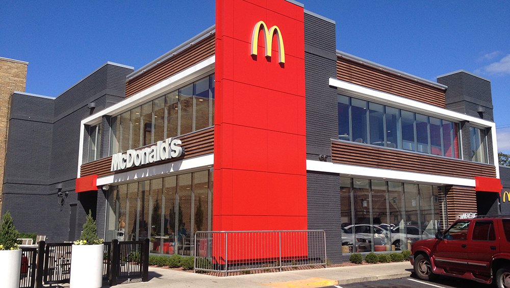 McDonald's broke out of a base Tuesday but initially strong volume was fading