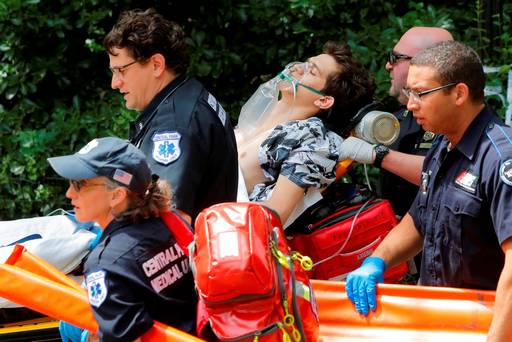 Medics remove a man who was injured after an explosion in Central Park in Manhattan New York U.S