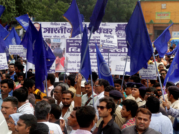 Members of Dalit Community protest in Ahmedabad on Tuesday against the assault on dalit members by cow protectors in Rajkot district