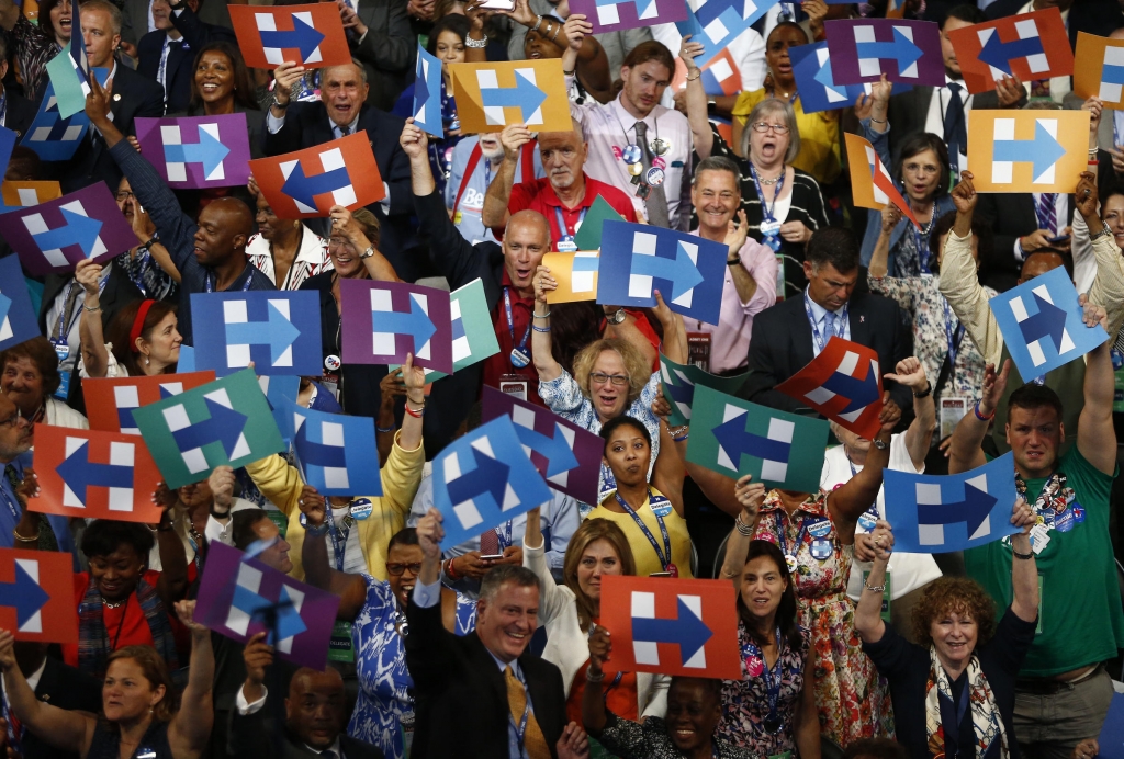 Delegates from New York hold signs in support of Hillary Clinton the 2016 Democratic presidential nominee during the Democratic National Convention in Philadelphia Pennsylvania U.S. on Tuesday