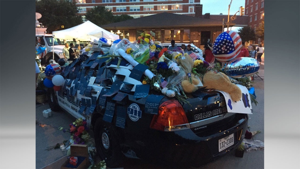 Memorial grows outside DPD headquarters