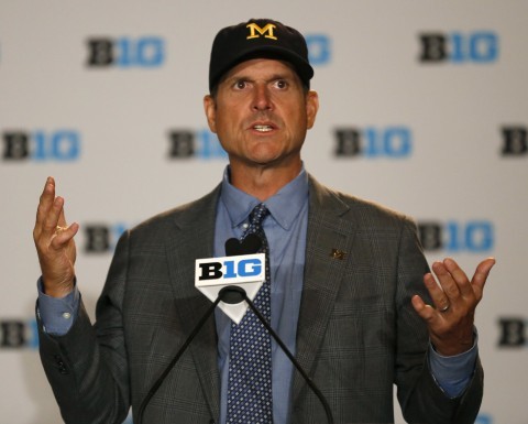 Michigan Coach Jim Harbaugh led the Wolverines to a 10-3 record in his first season