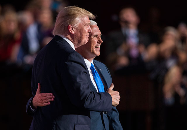 Donald Trump joins Mike Pence on stage after the Indiana governor accepted the party's vice-presidential nomination at the Republican National Convention in Cleveland