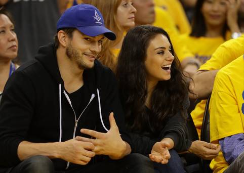 Actors Ashton Kutcher and Mila Kunis attend Game 2 of the 2016 NBA Finals between the Golden State Warriors and the Cleveland Cavaliers at ORACLE Arena