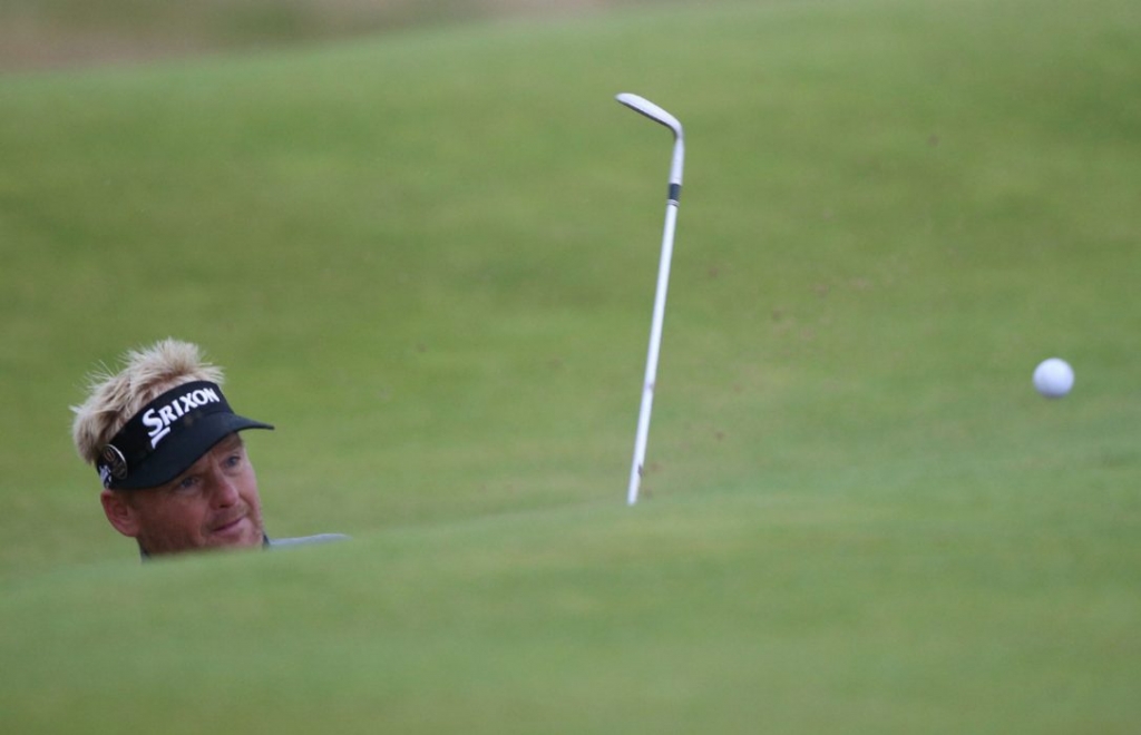 Denmark's Soren Kjeldsen plays from a bunker on the 17th hole of Royal Troon on Saturday. Kjeldsen played the first five holes of the back nine at 5-over to tumble out of contention at the British Open