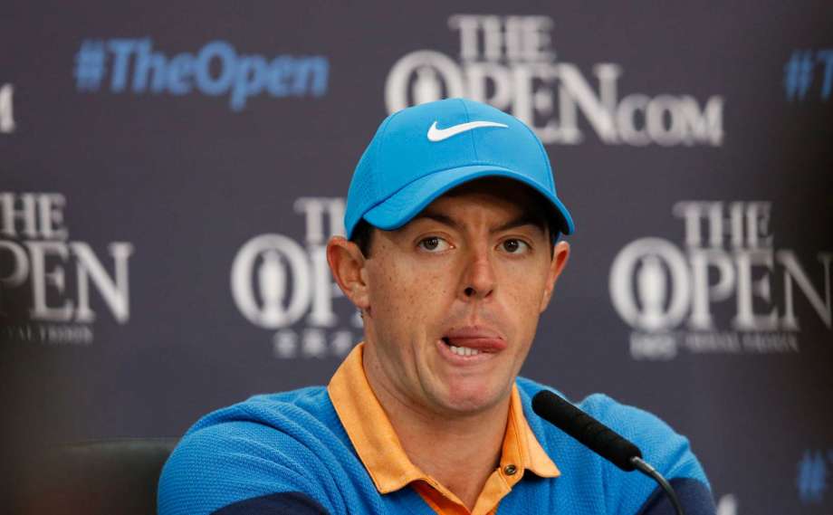 Rory Mc Ilroy of Northern Ireland listens to a question from the media at a press conference for the British Open Golf Championships at the Royal Troon Golf Club in Troon Scotland Tuesday