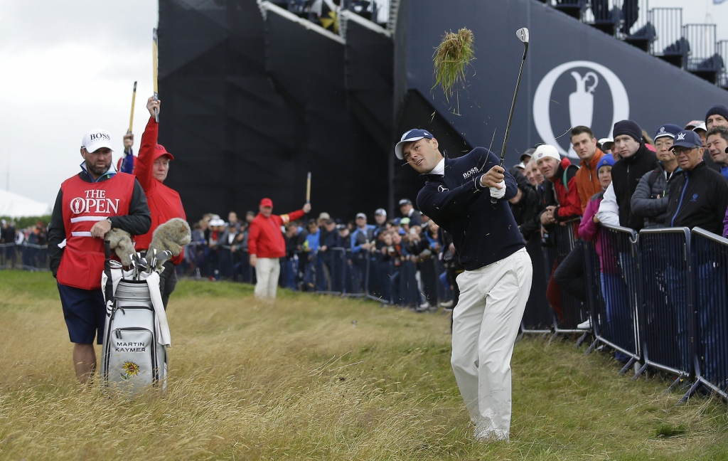 Martin Kaymer of Germany plays out of the rough on the 1st hole during the final round of the British Open Golf Championship at the Royal Troon Golf Club in Troon Scotland Sunday