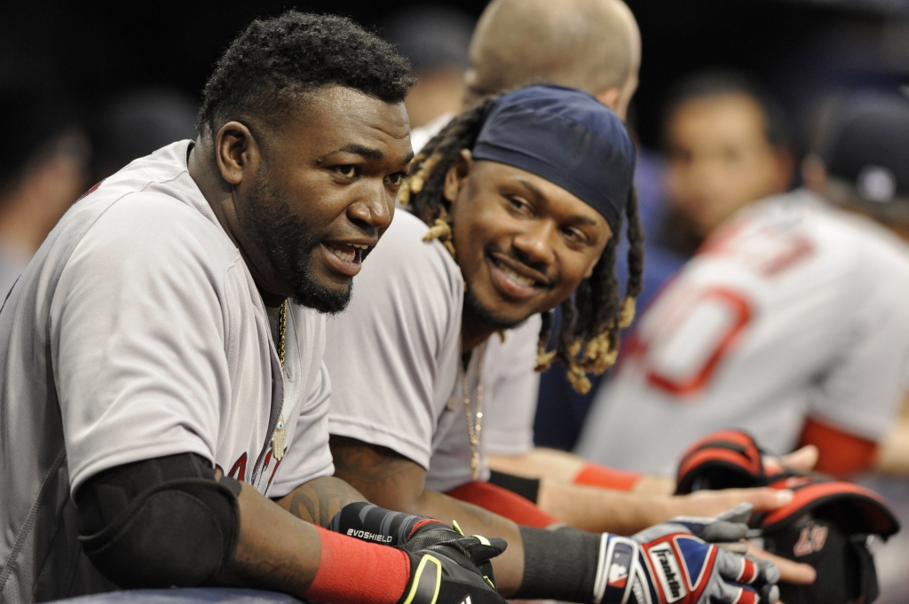 Boston Red Sox David Ortiz left and Hanley Ramirez talk in the dugout during a baseball game against the Tampa Bay Rays. 2016 in St. Petersburg Fla