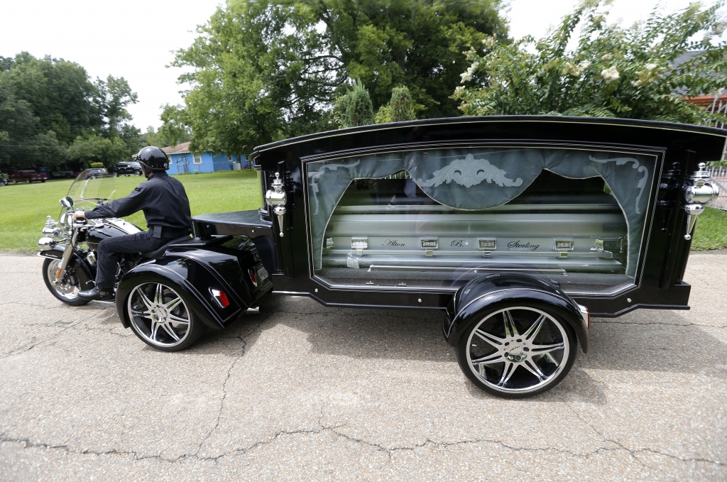 The casket of Alton Sterling arrives for burial at the Mount Pilgrim Benevolent Society Cemetery in Baton Rouge La. Friday