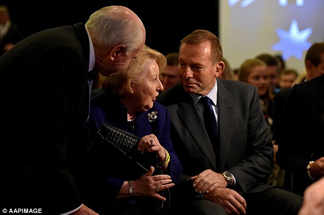 Mr Abbott was seated with fellow former PM John Howard and his wife Janette at the event at the weekend