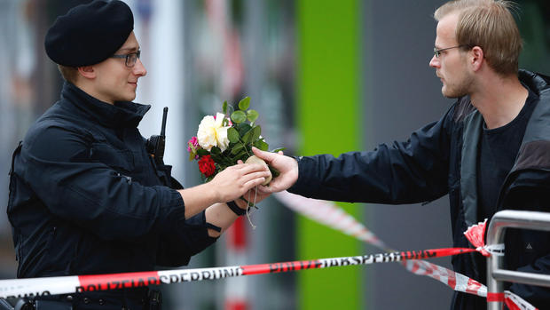 Police hunt for motive in Munich shooting that left 10 dead