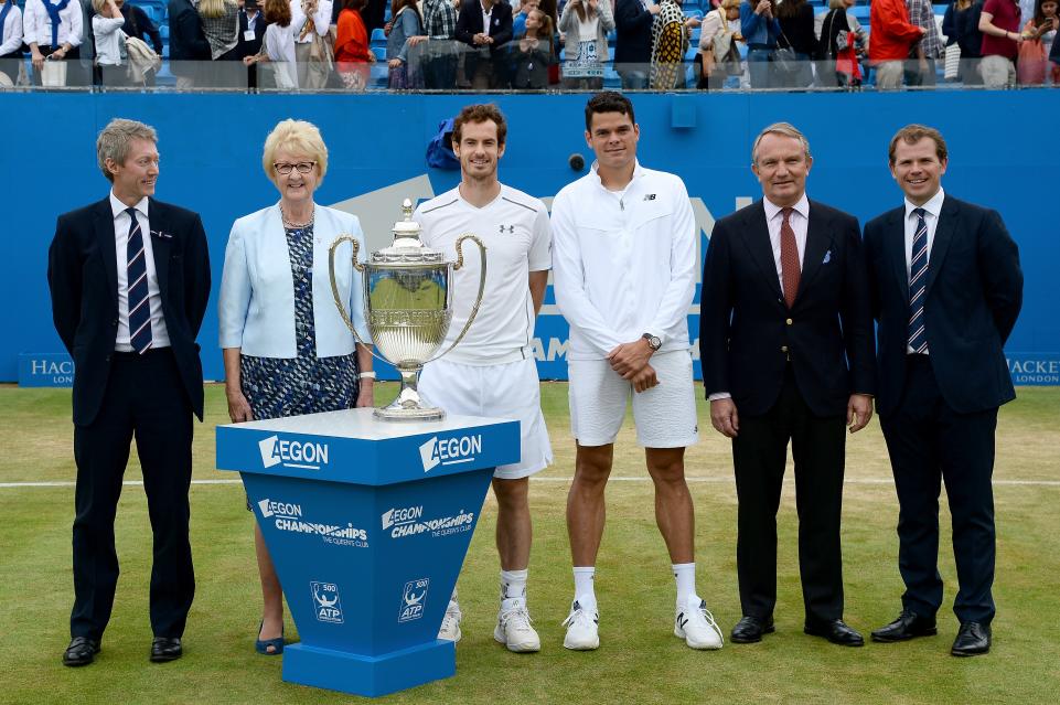 Andy Murray and Milos Raonic right and left center