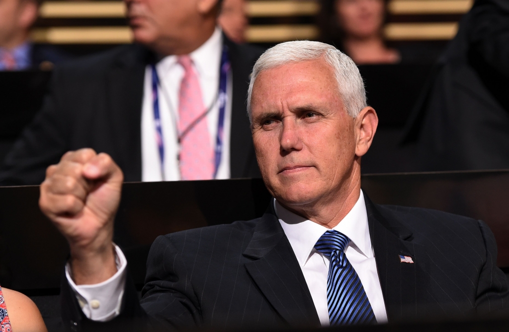 Republican vice presidential candidate Mike Pence makes a fist during the second day of the Republican National Convention