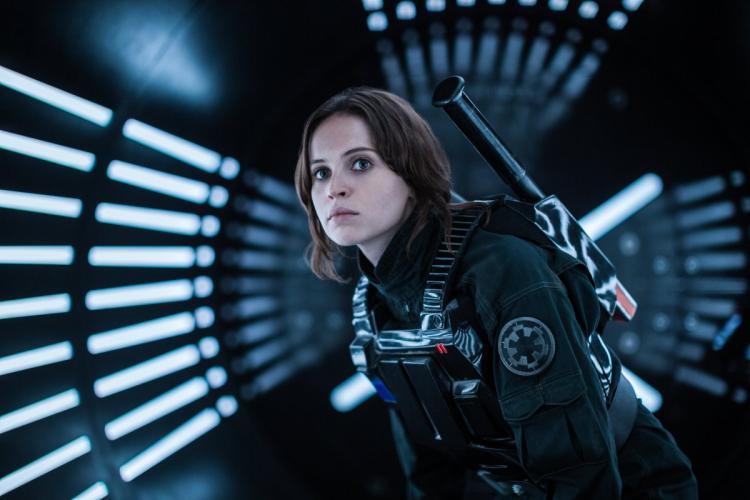 The new film centers on a cast of rebel fighters including Felicity Jones’ Jyn Erso as they try to steal the Empire’s plans for the Death Star