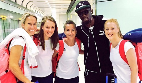 Gb women's players with Usain Bolt