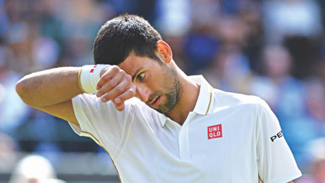 Nishikori retires from Wimbledon match with injured rib