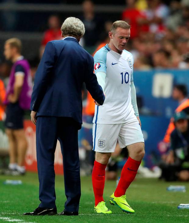 No rift Wayne Rooney insists the entire team backed Roy Hodgson