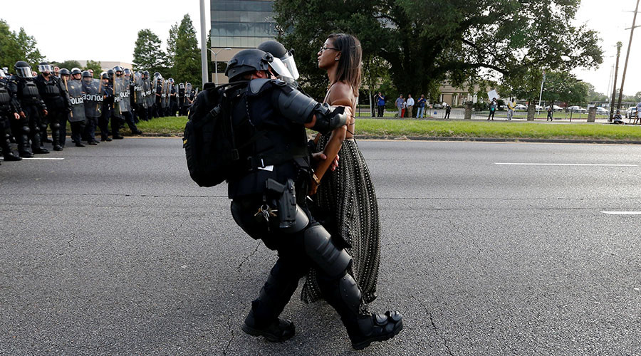 Protestor Ieshia Evans is detained by law enforcement near the headquarters of the Baton Rouge Police Department in Baton Rouge Louisiana