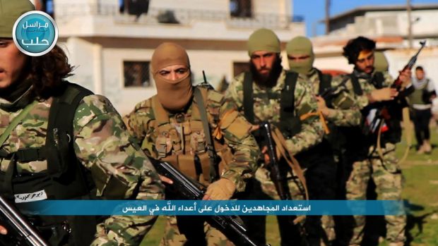 Nusra Front fighters marching toward the village of al Ais in Aleppo Syria in April