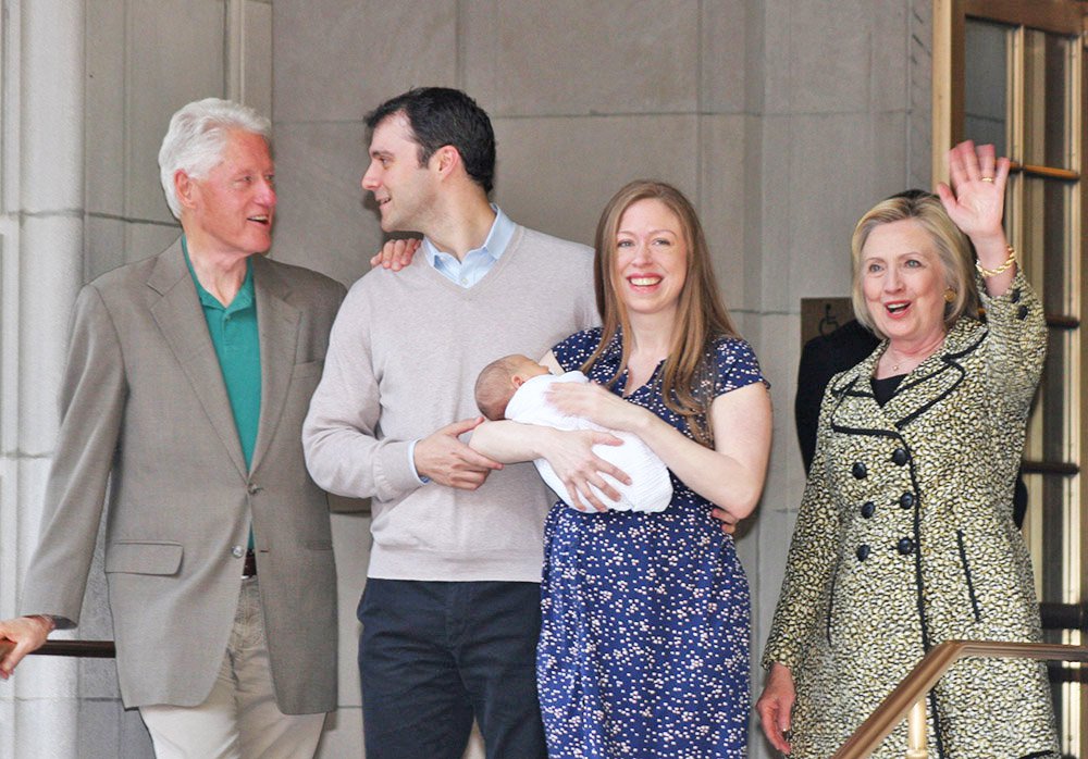 Chelsea Clinton holds her newborn son Aidan her second child as she leaves Lenox Hill Hospital with her husband Marc Mezvinsky her father former President Bill Clinton and Democratic presidential candidate Hillary Clinton in New York. William Regan