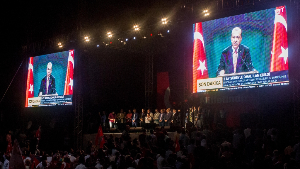 Video screens Wednesday night in Istanbul's Taksim Square show President Recep Tayyip Erdogan as he announced a three-month state of emergency following last Friday's failed coup