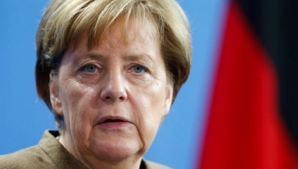 German Chancellor Angela Merkel speaks to media after her meeting with Tunisian Prime Minister Habib Essid at the Chancellery in Berlin Germany