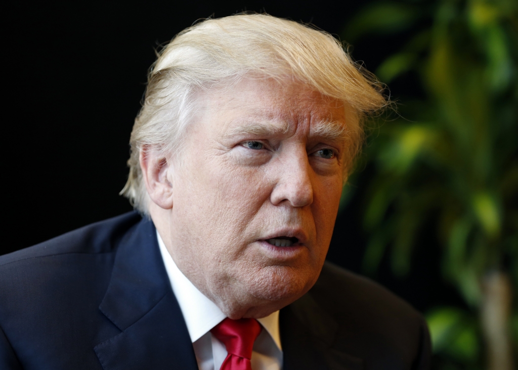 Republican presidential candidate Donald Trump speaks during a July 11 interview after a rally in Virginia Beach Va. Trump said recently that if he becomes president the United States under his leadership might not automatically come to the defense