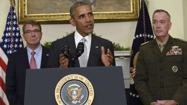 President Barack Obama flanked by Defense Secretary Ash Carter left and Joint Chiefs Chairman Gen. Joseph Dunford makes a statement on Afghanistan from the Roosevelt Room of the White House in Washington