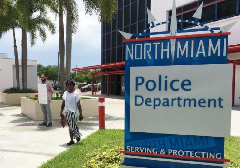 Miami resident Gabriel Pendas 33 stands alone outside the North Miami police department after a press conference which provided scant details regarding the police shooting of an unarmed black behavioral therapist helping an autistic patient who escaped