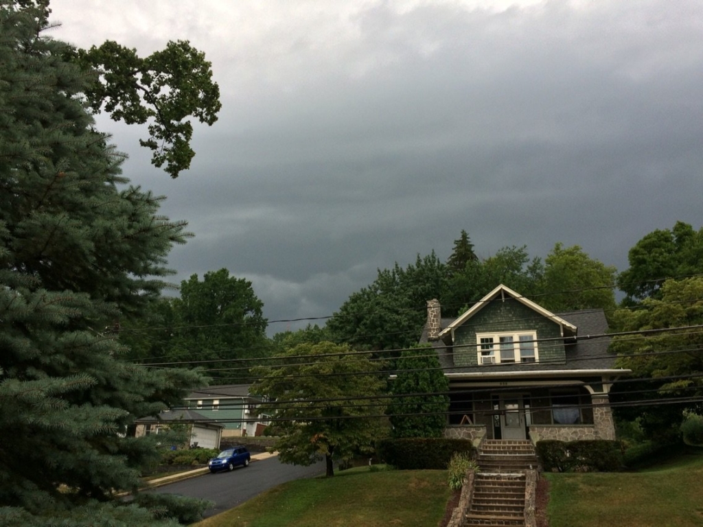 Ominous clouds build about 5:30 p.m. EDT Monday