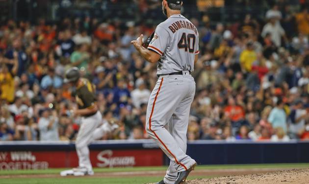 San Francisco Giants starting pitcher Madison Bumgarner watches San Diego Padres&#039 Wil Myers round the bases with a solo home run during the fifth inning of a baseball game Friday