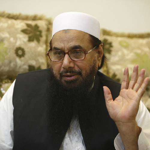 Hafiz Saeed talks to The Associated Press in Lahore Pakistan. Roaming freely in Pakistan despite a $10 million bounty on his head one of India’s most wanted men Saeed warns of demonstrations country