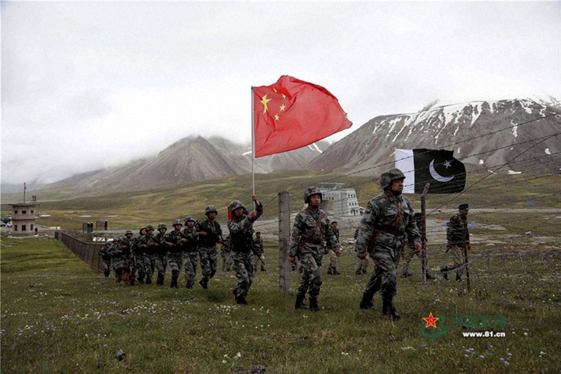 Xinjiang Chinese and Pakistan troops jointly patrolling the border connecting PoK with Xinjiang region