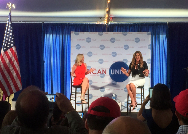 Caitlyn Jenner right speaks at an American Unity Fund brunch at the Rock and Roll Hall of Fame in Cleveland