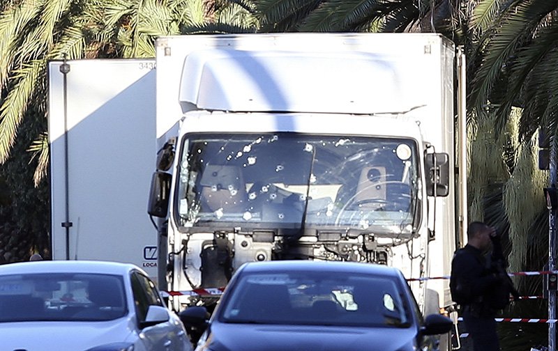 The truck which slammed into revelers late Thursday July 14 is seen near the site of the attack in Nice on Friday