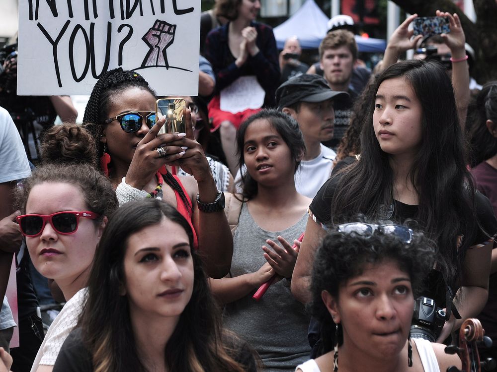 Participants at a Black Lives Matter event at the Vancouver Art in Vancouver BC