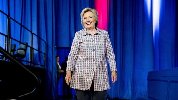 Democratic presidential candidate Hillary Clinton arrives to speak at the 117th National Convention of Veterans of Foreign Wars at the Charlotte Convention Center in Charlotte Monday