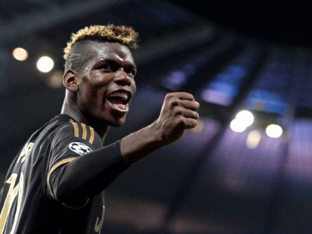 Paul Pogba celebrates a goal against Manchester City in Manchester