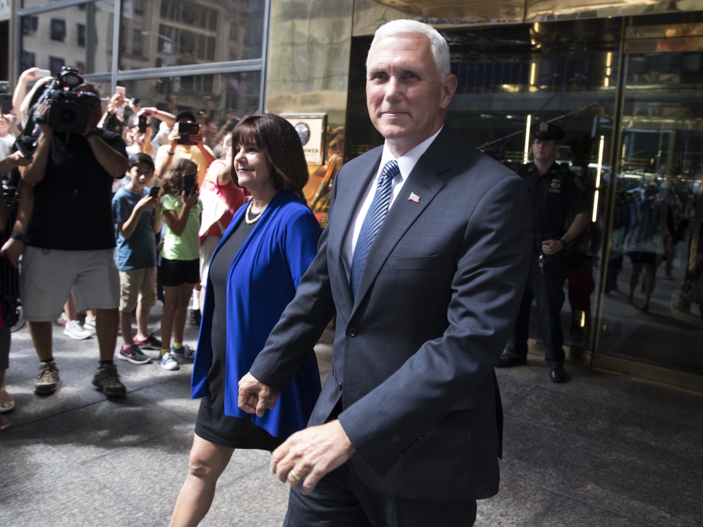 Pence and his wife Karen leave a meeting with Trump in New York on Friday.   Evan Vucci    
  AP