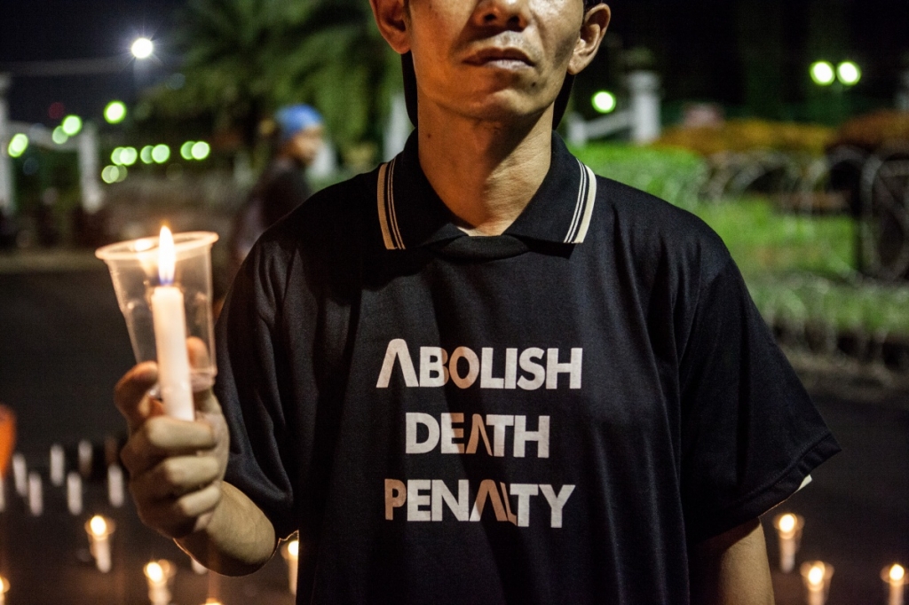 People demonstrate against the decision to give the death penalty to the prisoners