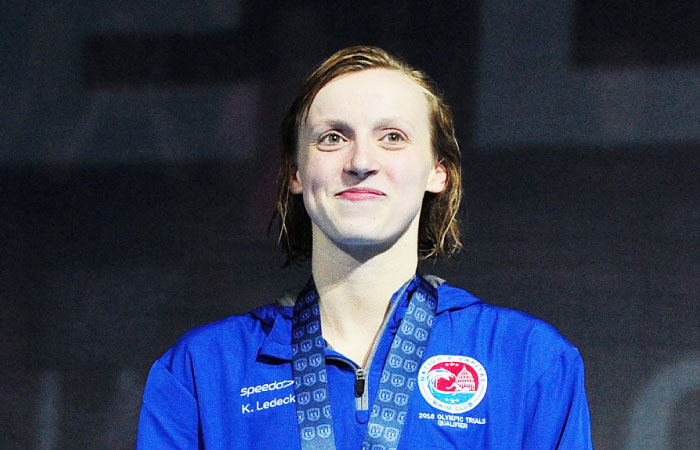 Katie Ledecky of the US participates in the medal ceremony for the women’s 400 meter freestyle during Day 2 of the 2016 US Olympic Team Swimming Trials in Omaha Nebraska Monday. — AFP