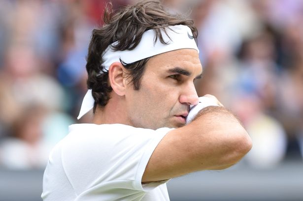 Roger Federer reacts