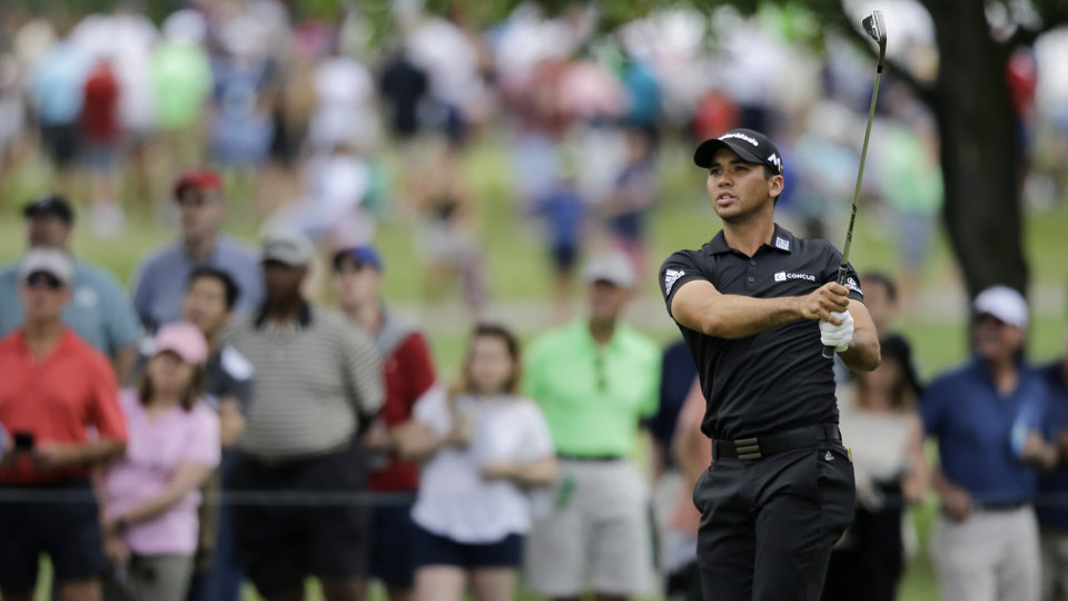 Dejak Jason Day hits to the second green during the third round of the Bridgestone Invitational at Firestone Country Club