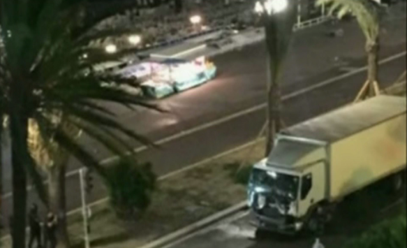 Official: Dozens dead after truck crashes into crowd in Nice, France; gunfire reported